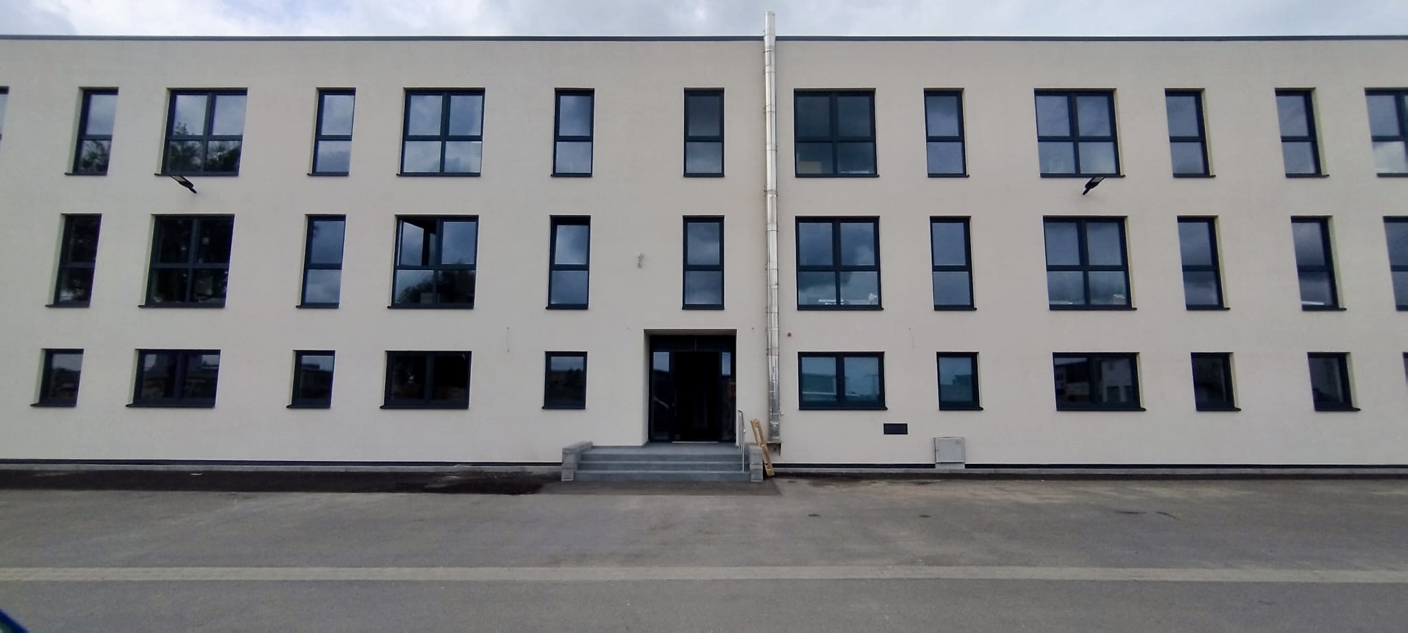 32-unit apartment hotel — front facade