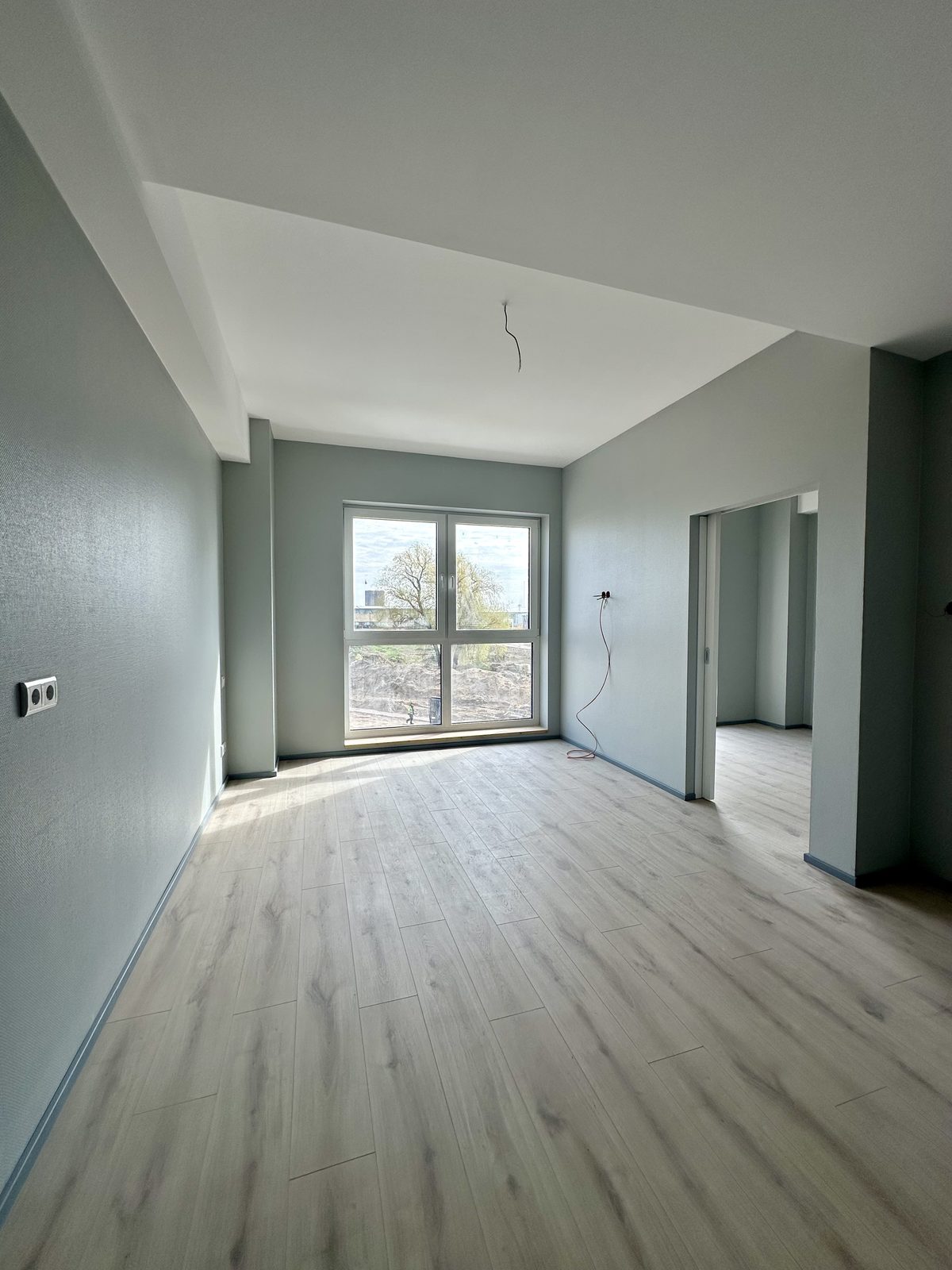 Finished unit interior — flooring and paint complete